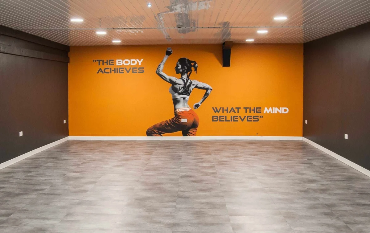 LD24’s fitness studio with its original orange feature wall