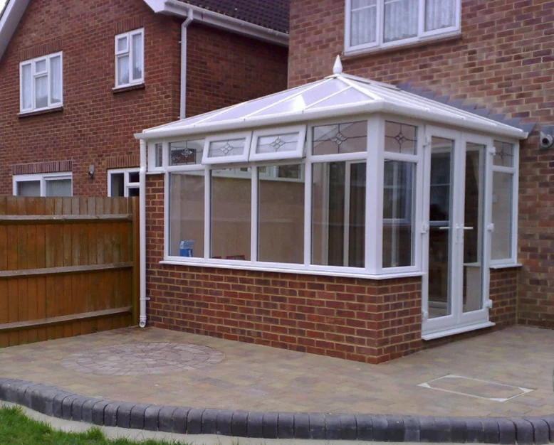 Conservatory on a brick house, pictured in the existing business gallery